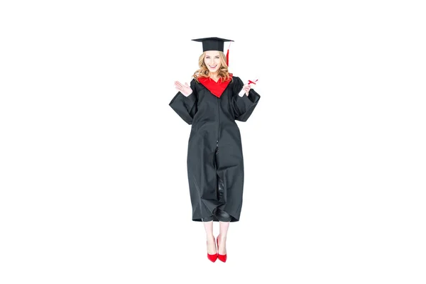 Student in graduation cap with diploma — Stock Photo