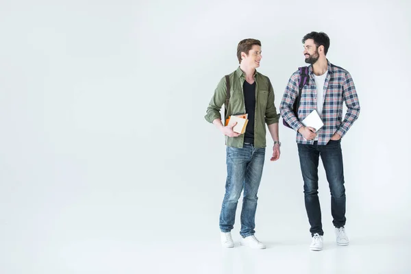 Students holding books — Stock Photo