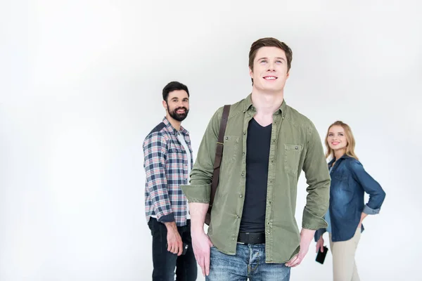 Young man with friend behind — Stock Photo