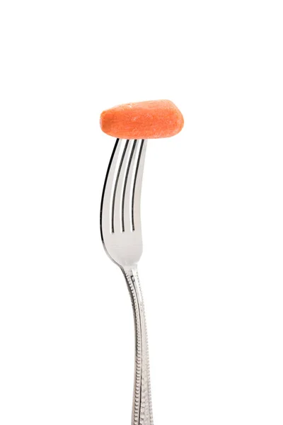 Fresh carrot on fork — Stock Photo