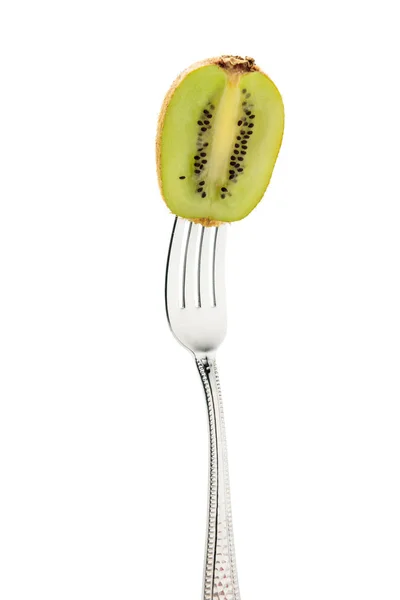 Kiwi fresco en tenedor - foto de stock