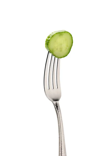 Fresh cucumber slice on fork — Stock Photo