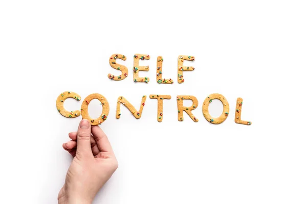 Self control lettering from sweets — Stock Photo