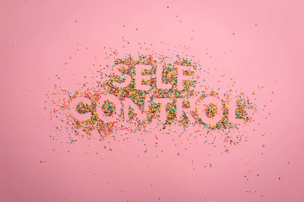 Self control lettering from sweets — Stock Photo