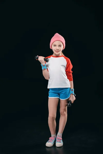 Girl training with dumbbells — Stock Photo