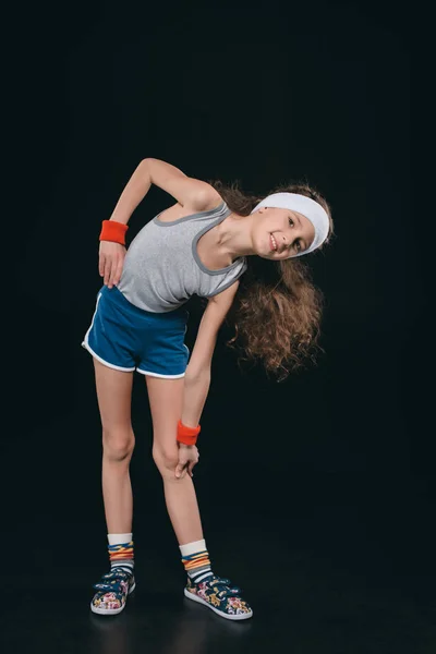 Дівчина в спортивному одязі вправа — стокове фото
