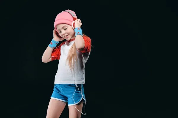 Спортивна дівчина в навушниках — стокове фото