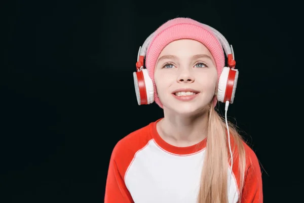 Menina desportiva em fones de ouvido — Fotografia de Stock