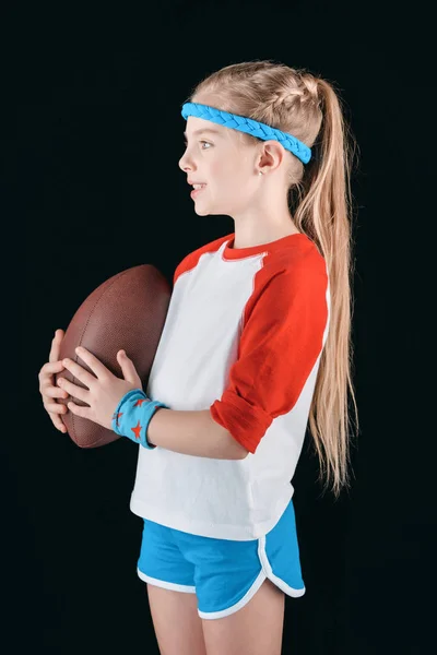 Girl with rugby ball — Stock Photo
