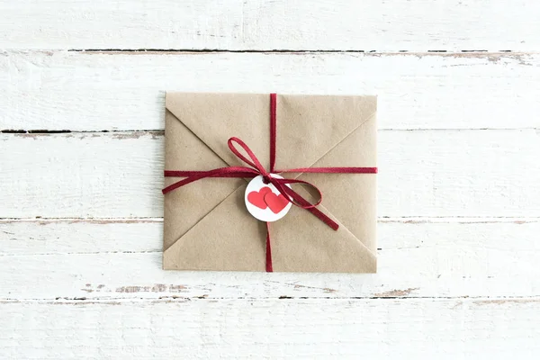 Kraft envelope with hearts — Stock Photo