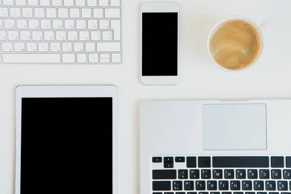 Laptops with digital tablet and smartphone — Stock Photo