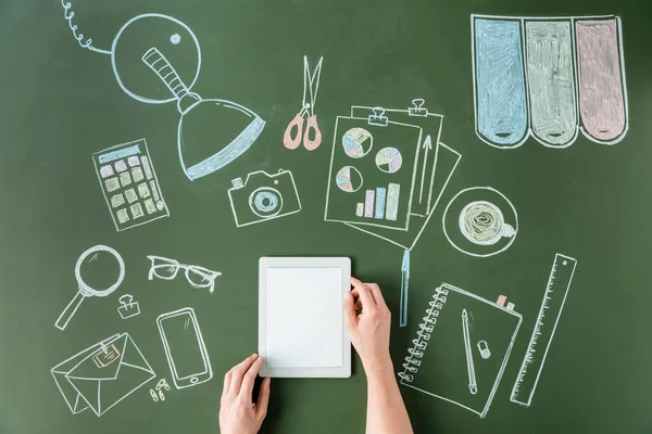 Hands holding tablet — Stock Photo