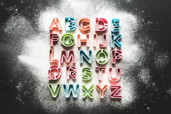 Baking forms for cookies in forms of letters — Stock Photo