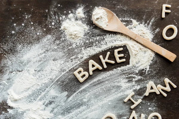 Word bake from cookies — Stock Photo
