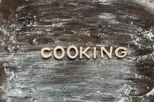 Word cooking made from dough — Stock Photo