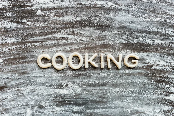 Word cooking made from dough — Stock Photo