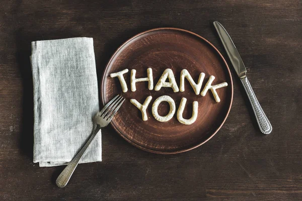 Lettering from dough on plate — Stock Photo