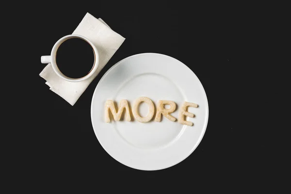 Lettering from dough on plate — Stock Photo