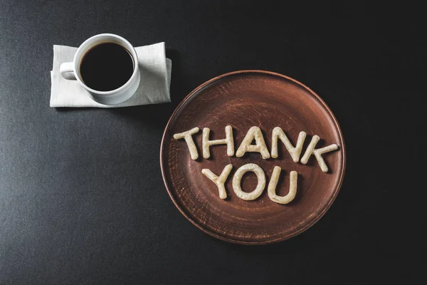 Lettering from dough on plate — Stock Photo