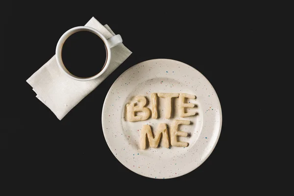 Lettering from dough on plate — Stock Photo