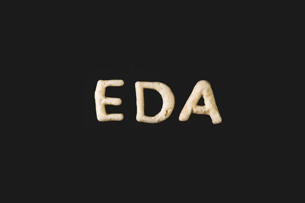 Word eda made from dough — Stock Photo