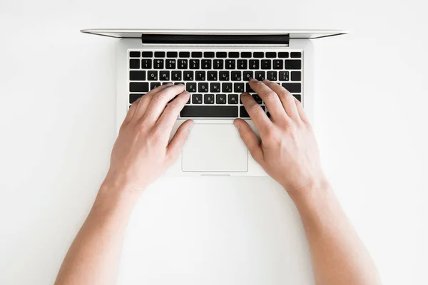 Human hands and laptop — Stock Photo