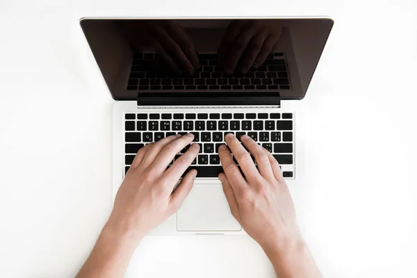 Human hands and laptop — Stock Photo