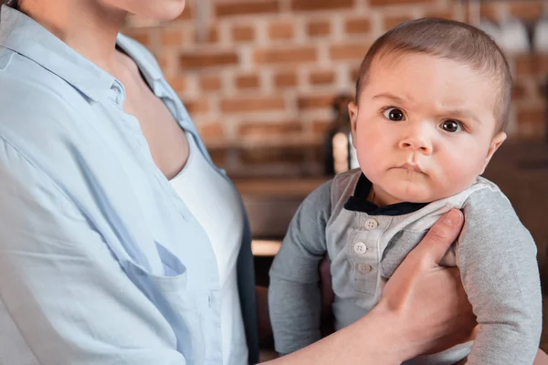 Baby boy with serious expression — Stock Photo