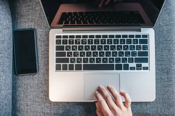 Laptop and smartphone with black screen — Stock Photo