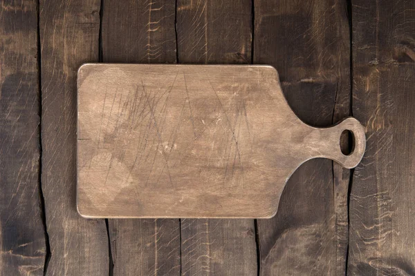 Scratched chopping board — Stock Photo