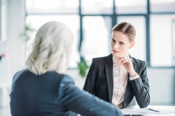 Businesswomen discussing project — Stock Photo