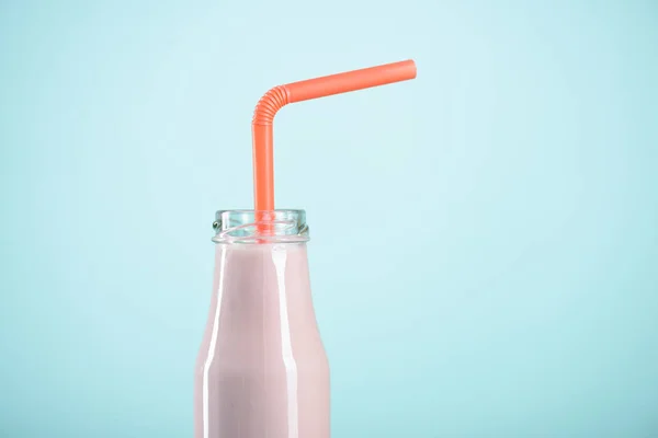 Milkshake in glass bottle — Stock Photo