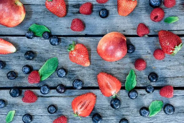 Fresh berries on wooden tabletop — Stock Photo