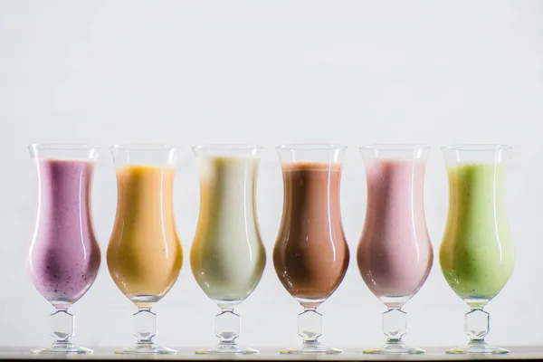 Delicious milkshakes in glasses — Stock Photo