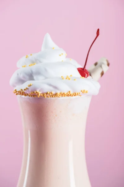 Milkshake with cream in glass — Stock Photo