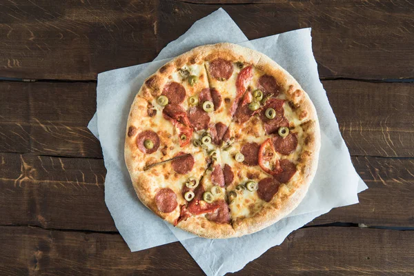 Delicious pizza on table 3 — Stock Photo