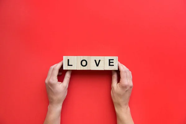 Love sign in human hands — Stock Photo