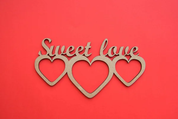 Hearts with Sweet love stencil — Stock Photo