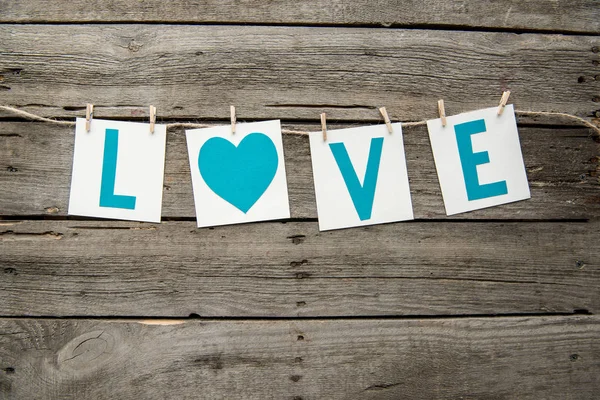 Décoration à la main avec signe d'amour — Stock Photo