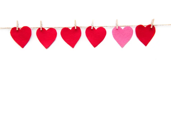 Red hearts paper cut with clothespins — Stock Photo