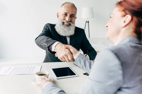 Business partners shaking hands — Stock Photo