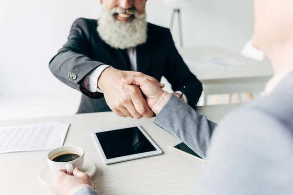 Business partners shaking hands — Stock Photo