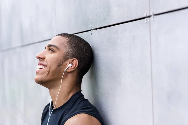 African american man in earphones — Stock Photo