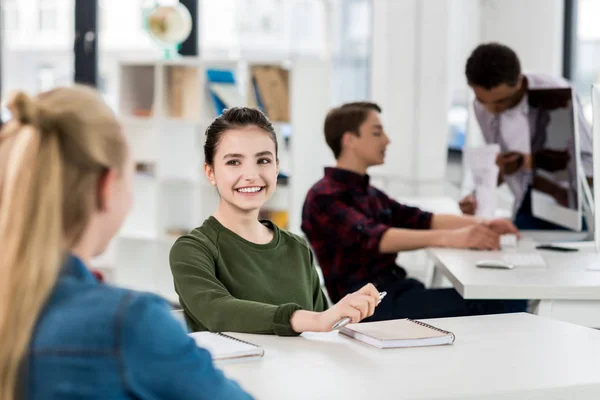 Students studying in class — Stock Photo