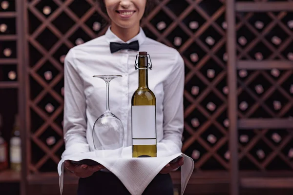 Sommelier with wine in cellar — Stock Photo