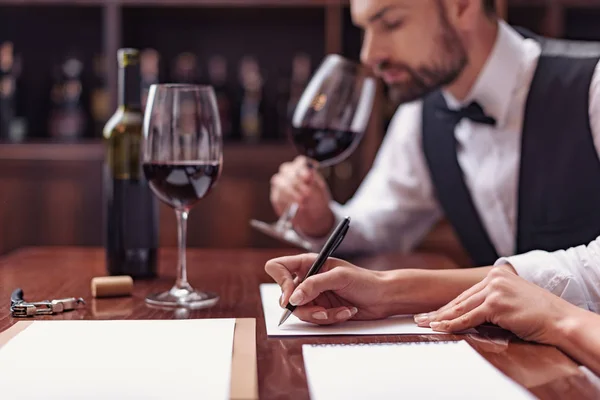 Sommeliers tasting wine in cellar — Stock Photo