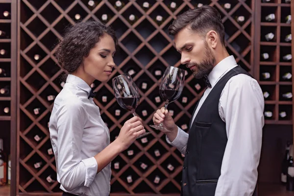 Sommeliers tasting wine in cellar — Stock Photo