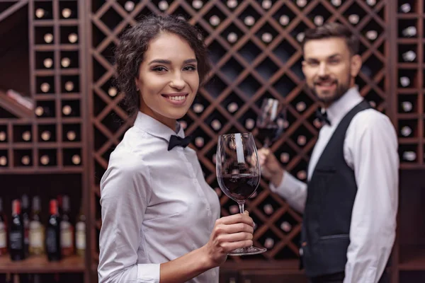 Sommeliers tasting wine in cellar — Stock Photo