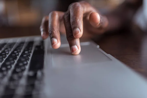 Afro man using laptop — Stock Photo