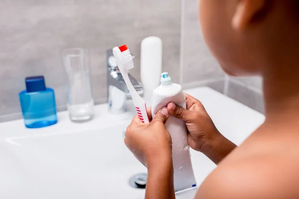 Kid with tooth brush and paste — Stock Photo